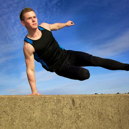 Free running parkour atlhelte in the beach of barcelona header